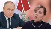 ПУТИН ПОСТХУМНО ОДЛИКОВАО ДАРЈУ ДУГИНУ: Орден за храброст убијеној новинарки