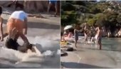 CIRKUS NA ITALIJANSKOJ PLAŽI: Branio suprugu nindža potezom, snimak tuče postao hit (VIDEO)