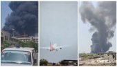 ПРВИ СНИМЦИ АВИОНСКЕ НЕСРЕЋЕ У ИНДИЈИ: Остаци авиона у пламену, црни дим захватио град (ФОТО/ВИДЕО)