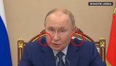 ШТА ЈЕ ТО ПУТИНУ НА РАМЕНИМА? Снимак из Савета безбедности збунио свет - усред говора о нуклеарном наоружању (ВИДЕО)
