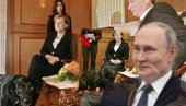 КАКО ЈЕ ПУТИН УЋУТКАО МЕРКЕЛОВУ? Псом показао психолошку игру - Ангела заборавила где се налази