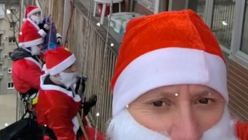 ПРИПАДНИЦИ САЈ КАО ДЕДА МРАЗОВИ: Ужадима се спустили са крова и поклонима обрадовали малишане на Институту за мајку и дете (ВИДЕО)