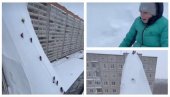 NEVEROVATNI SNIMCI NA MREŽAMA: Deca na Kamčatki sankaju se sa vrhova zgrada! (VIDEO)